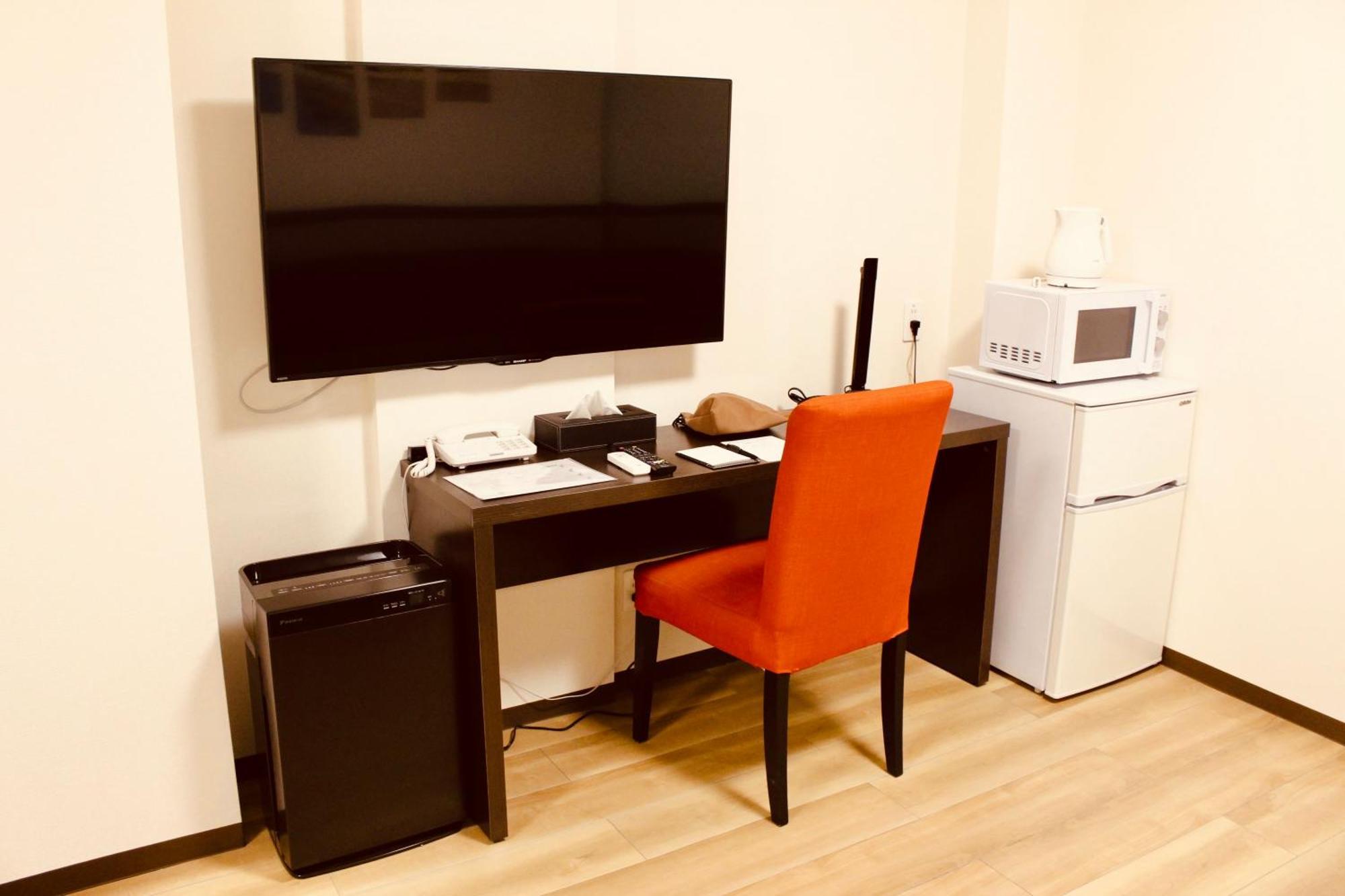 Phoenix Park Hotel Nago Phòng bức ảnh